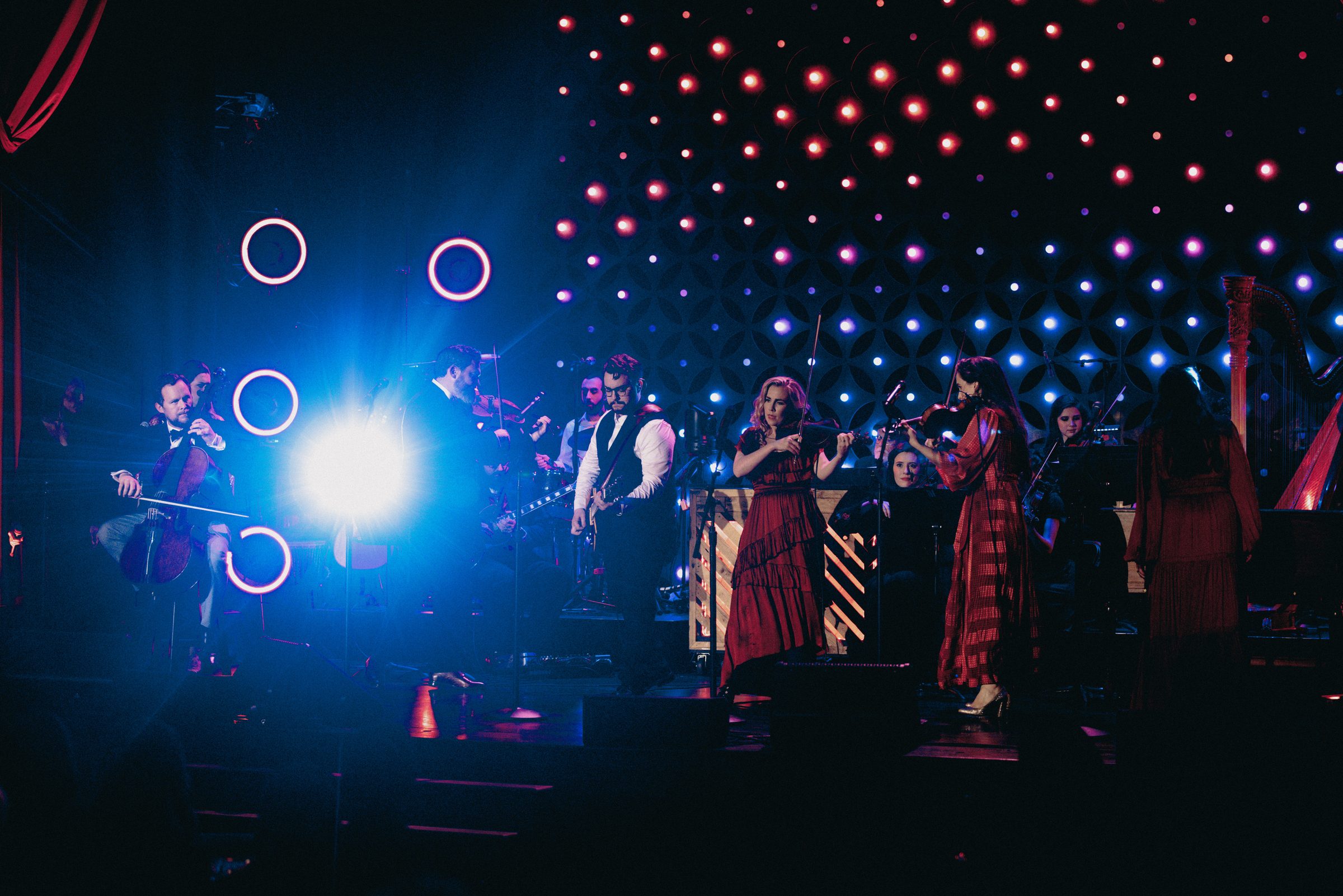 The Annie Moses Band in concert under blue stage light